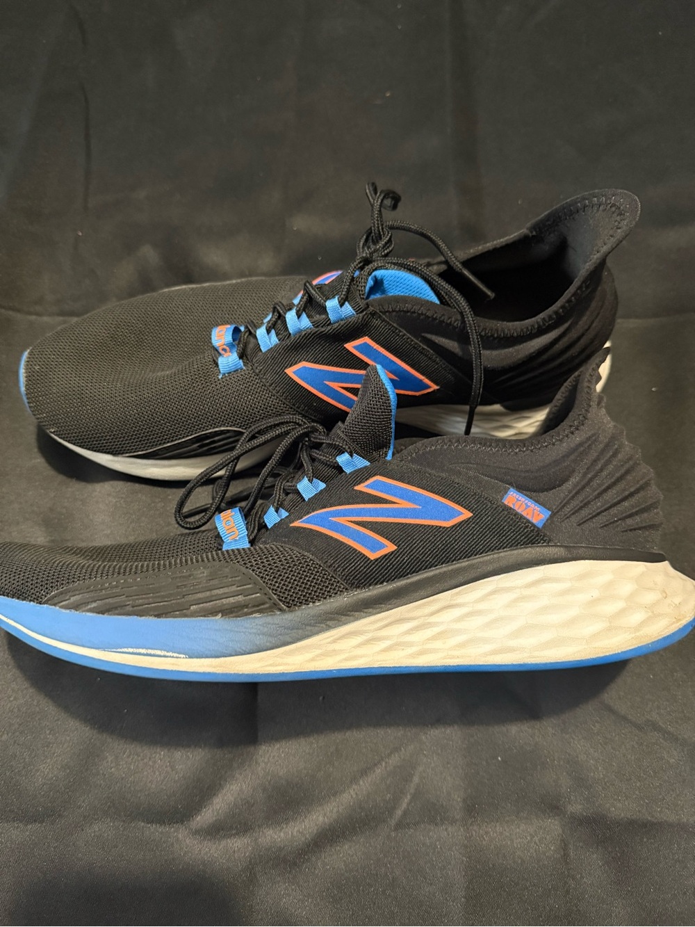 New Balance Men’s Black Sneakers with Blue and Orange Accents